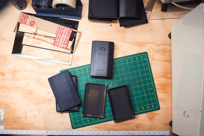 Workbench spotlighting an iFixit Pro Tech Toolkit.