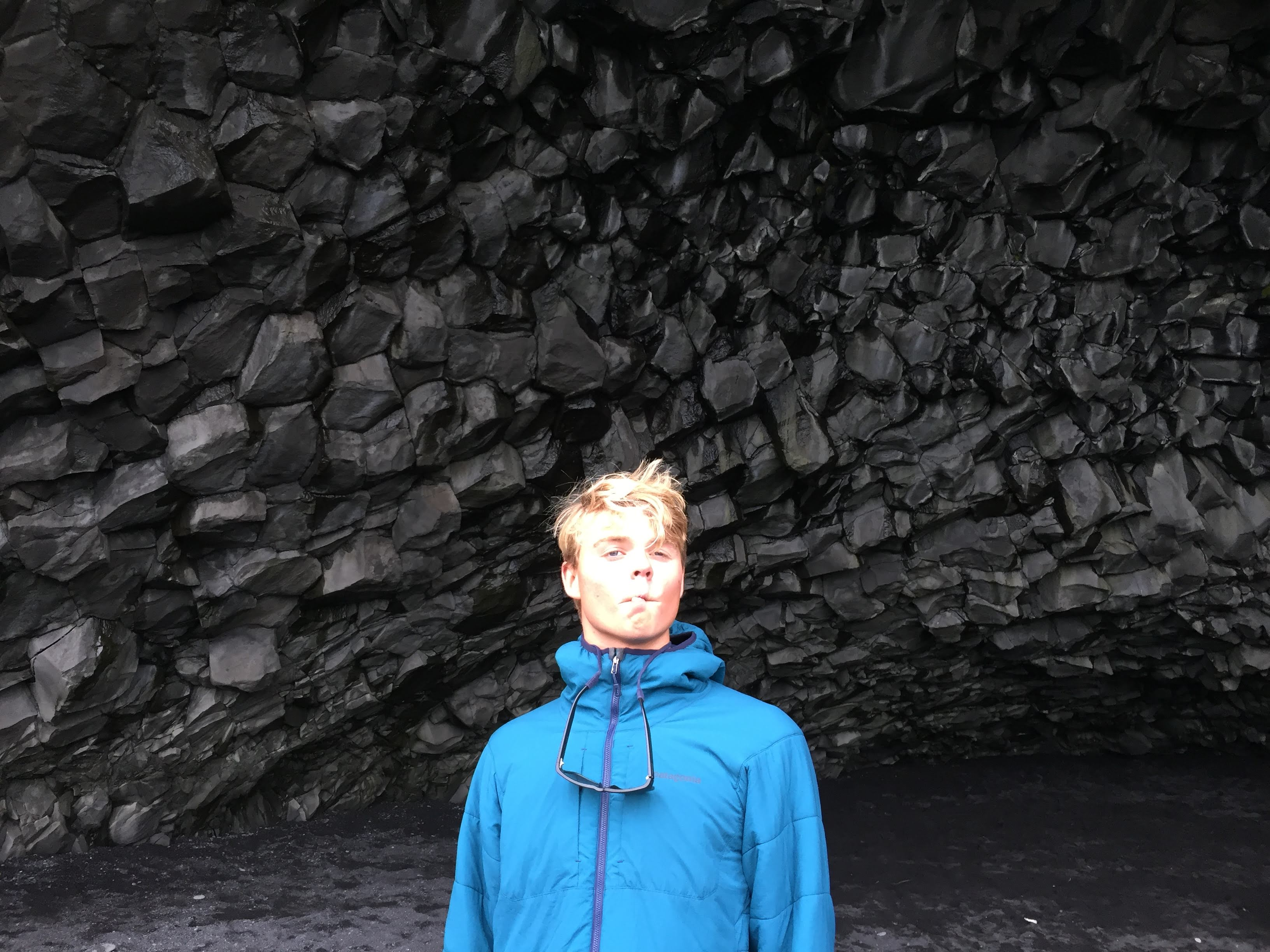 Mason in a cave in Iceland